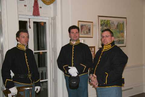 Band members Eric Johnson, George Niehaus and 'Bass Drum' Barry Woodworth take a break before the ball begins.